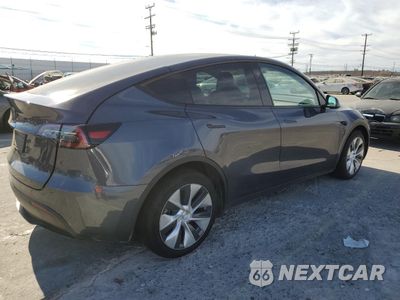 Trzecie zdjęcie samochodu z tyłu: 2023 TESLA MODEL Y VIN:7SAYGDED8PF966337 - miniatura