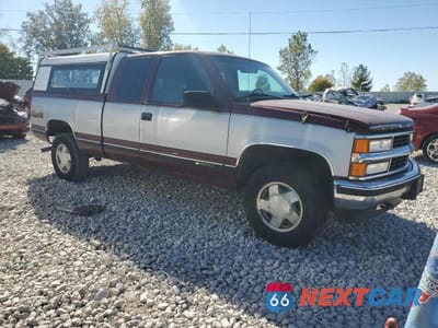 Czwarte zdjęcie samochodu z boku: 2001 CHEVROLET GMT-400 K1500 VIN:1GCEK19R0VE144021 - miniatura
