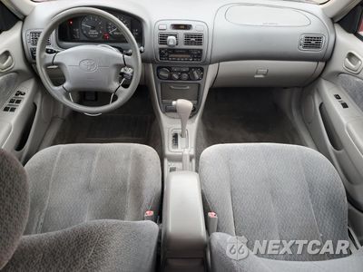 Zdjęcie 8 z 12 samochodu: 2001 TOYOTA COROLLA CE VIN:2T1BR12E61C427381 - miniatura