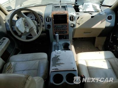 Zdjęcie 12 z 23 samochodu: 2004 FORD F150 SUPERCREW VIN:1FTPW125X4KD50385 - miniatura