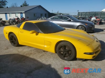 Czwarte zdjęcie samochodu z boku: 2003 CHEVROLET CORVETTE VIN:1G1YY22G135101386 - miniatura