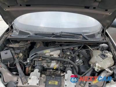 Zdjęcie 12 z 13 samochodu: 2000 CHEVROLET VENTURE VIN:1GNDX03E0YD350065 - miniatura