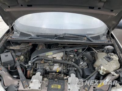 Zdjęcie 12 z 13 samochodu: 2000 CHEVROLET VENTURE VIN:1GNDX03E0YD350065 - miniatura