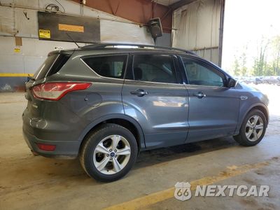 Trzecie zdjęcie samochodu z tyłu: 2016 FORD ESCAPE SE VIN:1FMCU0GX1GUA60078 - miniatura