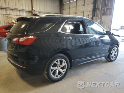 Trzecie zdjęcie samochodu z tyłu: 2018 CHEVROLET EQUINOX PREMIER VIN:2GNAXMEV4J6159423 - miniatura