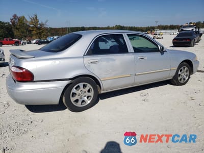 Trzecie zdjęcie samochodu z tyłu: 2002 MAZDA 626 LX VIN:1YVGF22C125296145 - miniatura