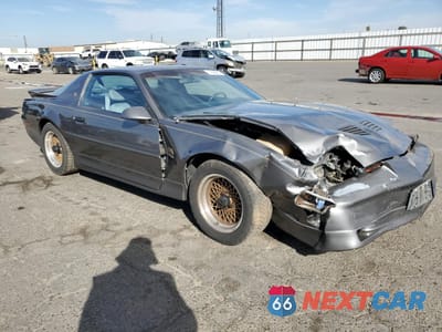 Czwarte zdjęcie samochodu z boku: 1989 PONTIAC FIREBIRD TRANS AM VIN:1G2FW218XKL231888 - miniatura