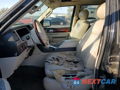 Zdjęcie 7 z 12 samochodu: 2003 LINCOLN NAVIGATOR VIN:5LMFU28RX3LJ32286 - miniatura