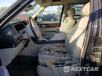 Zdjęcie 7 z 12 samochodu: 2003 LINCOLN NAVIGATOR VIN:5LMFU28RX3LJ32286 - miniatura