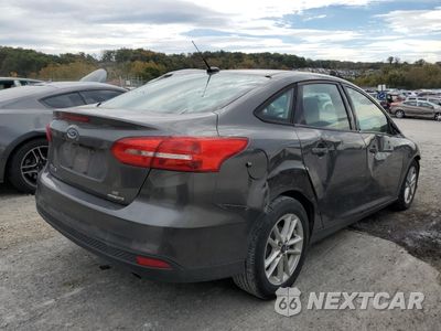 Trzecie zdjęcie samochodu z tyłu: 2016 FORD FOCUS SE VIN:1FADP3F29GL231212 - miniatura