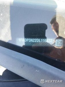 Zdjęcie 12 z 12 samochodu: 2013 FORD FOCUS TITANIUM VIN:1FADP3N22DL116433 - miniatura