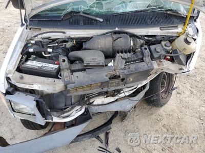 Zdjęcie 12 z 13 samochodu: 2001 FORD ECONOLINE E250 VAN VIN:1FTNS24L41HB03795 - miniatura
