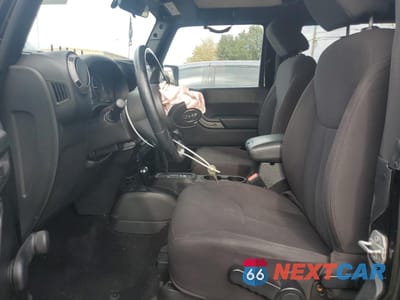 Zdjęcie 7 z 13 samochodu: 2015 JEEP WRANGLER SPORT VIN:1C4AJWAG6FL678646 - miniatura