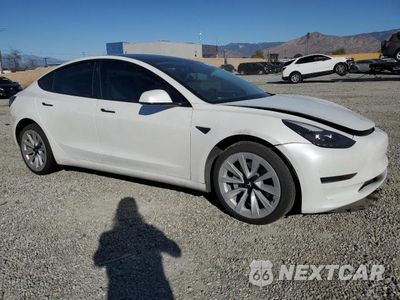 Czwarte zdjęcie samochodu z boku: 2021 TESLA MODEL 3 VIN:5YJ3E1EA9MF063840 - miniatura
