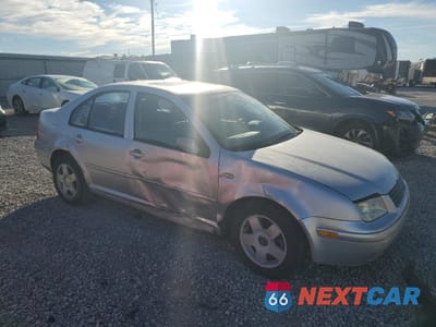 Czwarte zdjęcie samochodu z boku: 2000 VOLKSWAGEN JETTA GLS VIN:3VWSA29M7YM013521 - miniatura