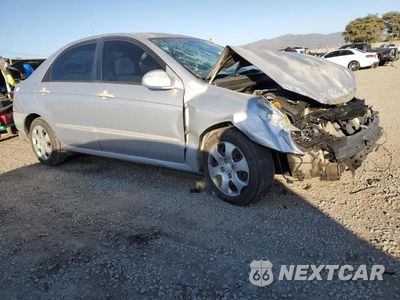 Czwarte zdjęcie samochodu z boku: 2004 KIA SPECTRA LX VIN:KNAFE121145031089 - miniatura