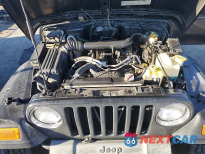 Zdjęcie 11 z 12 samochodu: 2001 JEEP WRANGLER / TJ SPORT VIN:1J4FA49S51P333140 - miniatura