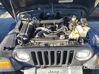 Zdjęcie 11 z 12 samochodu: 2001 JEEP WRANGLER / TJ SPORT VIN:1J4FA49S51P333140 - miniatura