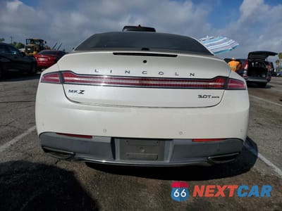 Zdjęcie 6 z 13 samochodu: 2018 LINCOLN MKZ RESERVE VIN:3LN6L5FC2JR605487 - miniatura