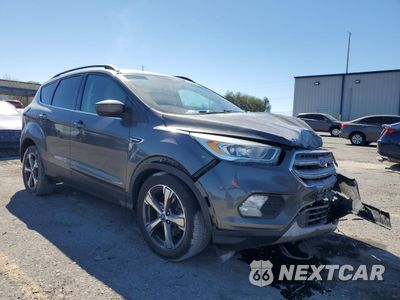 Czwarte zdjęcie samochodu z boku: 2017 FORD ESCAPE SE VIN:1FMCU9G9XHUB01640 - miniatura
