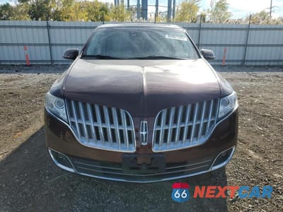 Piąte zdjęcie samochodu w środku: 2011 LINCOLN MKT VIN:2LMHJ5AT5BBJ51164 - miniatura