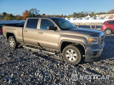 Czwarte zdjęcie samochodu z boku: 2014 GMC SIERRA K1500 SLE VIN:3GTU2UEC5EG136133 - miniatura