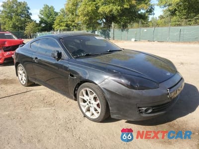 Czwarte zdjęcie samochodu z boku: 2008 HYUNDAI TIBURON GT VIN:KMHHN66F48U267273 - miniatura