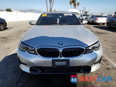 Piąte zdjęcie samochodu w środku: 2019 BMW 330I VIN:WBA5R1C5XKAK09328 - miniatura