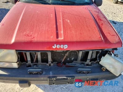 Zdjęcie 12 z 14 samochodu: 1994 JEEP GRAND CHEROKEE LAREDO VIN:1J4FX58S5RC174094 - miniatura