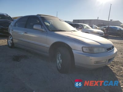 Czwarte zdjęcie samochodu z boku: 1997 HONDA ACCORD SE VIN:1HGCD5600VA066010 - miniatura