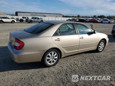 Trzecie zdjęcie samochodu z tyłu: 2002 TOYOTA CAMRY LE VIN:JTDBF30KX20057402 - miniatura