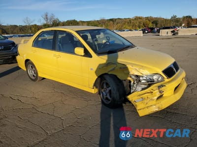 Czwarte zdjęcie samochodu z boku: 2003 MITSUBISHI LANCER OZ RALLY VIN:JA3AJ86E53U050620 - miniatura