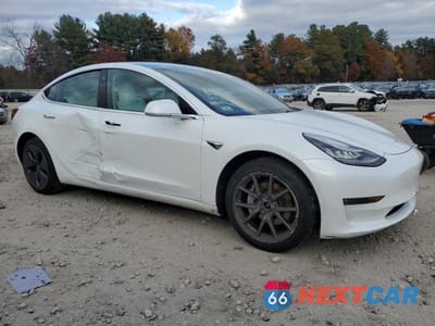 Czwarte zdjęcie samochodu z boku: 2018 TESLA MODEL 3 VIN:5YJ3E1EBXJF134712 - miniatura