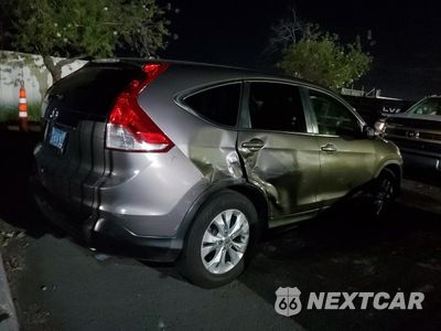 Trzecie zdjęcie samochodu z tyłu: 2012 HONDA CR-V EX VIN:3CZRM3H5XCG702527 - miniatura