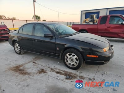 Czwarte zdjęcie samochodu z boku: 2002 SATURN SL2 VIN:1G8ZK52732Z142747 - miniatura