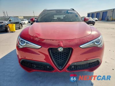 Piąte zdjęcie samochodu w środku: 2022 ALFA ROMEO STELVIO TI VIN:ZASPAKBN9N7D28748 - miniatura