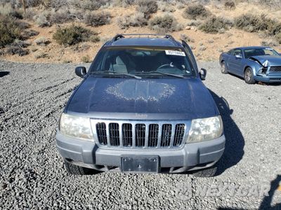 Piąte zdjęcie samochodu w środku: 2001 JEEP GRAND CHEROKEE LAREDO VIN:1J4GX48S81C628681 - miniatura
