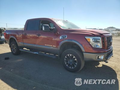 Czwarte zdjęcie samochodu z boku: 2017 NISSAN TITAN XD SL VIN:1N6BA1F41HN517518 - miniatura