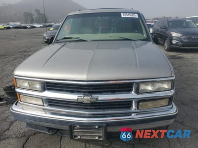 Piąte zdjęcie samochodu w środku: 1999 CHEVROLET SUBURBAN K1500 VIN:3GNFK16R7XG129897 - miniatura