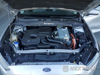 Zdjęcie 11 z 12 samochodu: 2014 FORD FUSION S HYBRID VIN:3FA6P0UU1ER360085 - miniatura