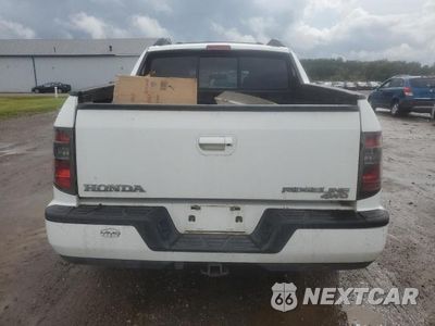 Zdjęcie 6 z 11 samochodu: 2014 HONDA RIDGELINE RTL VIN:5FPYK1F56EB004351 - miniatura