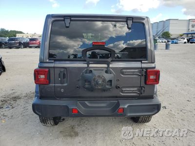 Zdjęcie 6 z 14 samochodu: 2019 JEEP WRANGLER UNLIMITED SAHARA VIN:1C4HJXENXKW664903 - miniatura