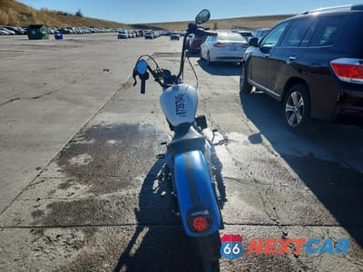 Czwarte zdjęcie samochodu z boku: 2009 HARLEY-DAVIDSON XL883 L VIN:1HD4CR2149K402946 - miniatura