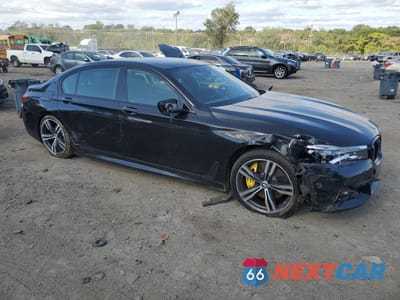 Czwarte zdjęcie samochodu z boku: 2019 BMW 750 XI VIN:WBA7F2C58KB240403 - miniatura