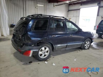 Piąte zdjęcie samochodu w środku: 2005 HYUNDAI SANTA FE GLS VIN:KM8SC73E95U896407 - miniatura