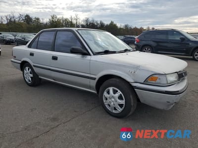 Czwarte zdjęcie samochodu z boku: 1991 TOYOTA COROLLA VIN:2T1AE94A3MC063750 - miniatura