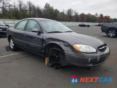 Czwarte zdjęcie samochodu z boku: 2002 FORD TAURUS SES VIN:1FAFP55U02A196202 - miniatura