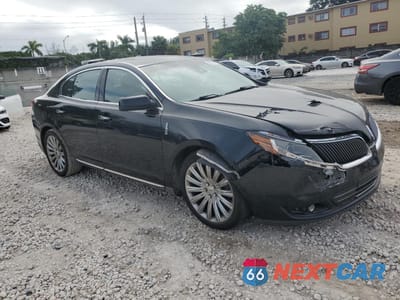 Czwarte zdjęcie samochodu z boku: 2014 LINCOLN MKS VIN:1LNHL9EK8EG600624 - miniatura