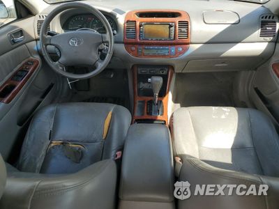 Zdjęcie 8 z 12 samochodu: 2004 TOYOTA CAMRY LE VIN:4T1BF30K94U066986 - miniatura