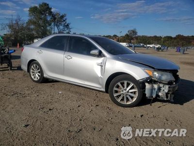 Czwarte zdjęcie samochodu z boku: 2014 TOYT CAMRY HYBR VIN:4T1BD1FK9EU109659 - miniatura